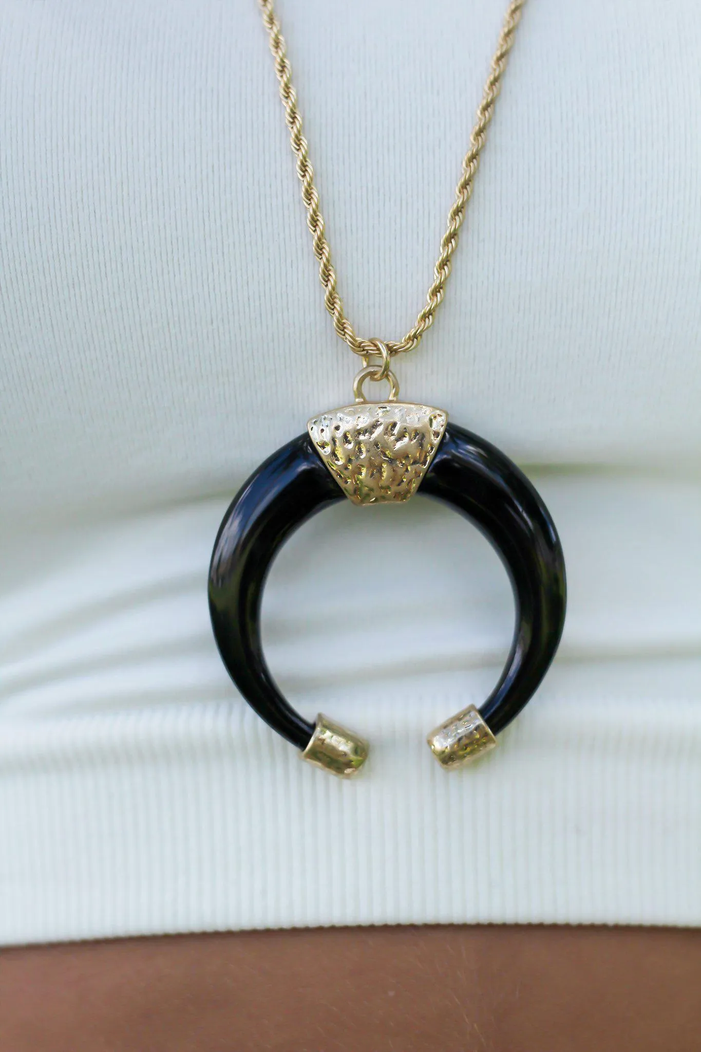 Gold Necklace with Black Horn Pendant