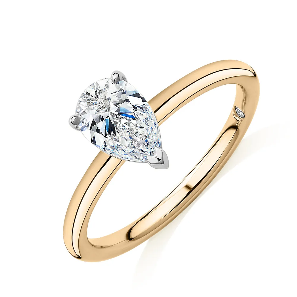 Signature Simulant Diamond 1.00 carat* pear solitaire engagement ring in 14 carat yellow and white gold