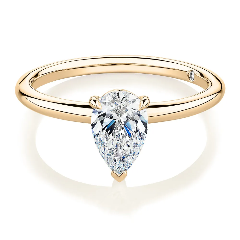 Signature Simulant Diamond 1.00 carat* pear solitaire engagement ring in 14 carat yellow gold