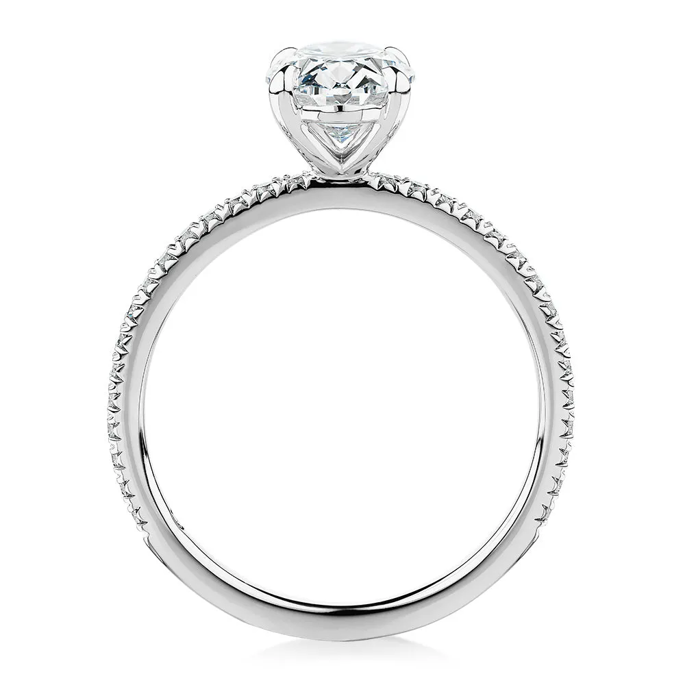 Signature Simulant Diamond 1.74 carat* TW oval and round brilliant shouldered engagement ring in 14 carat white gold